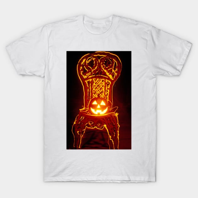 Carved smiling pumpkin on chair T-Shirt by photogarry